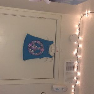 Blue peace sign shirt